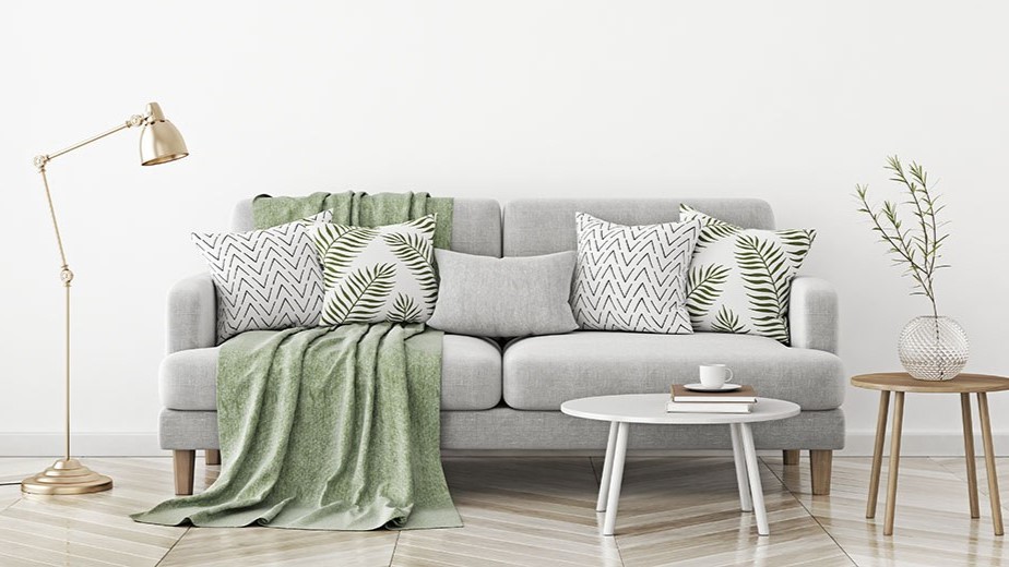 Sofa living room set-up Living room setup with seating, tables, and lamps