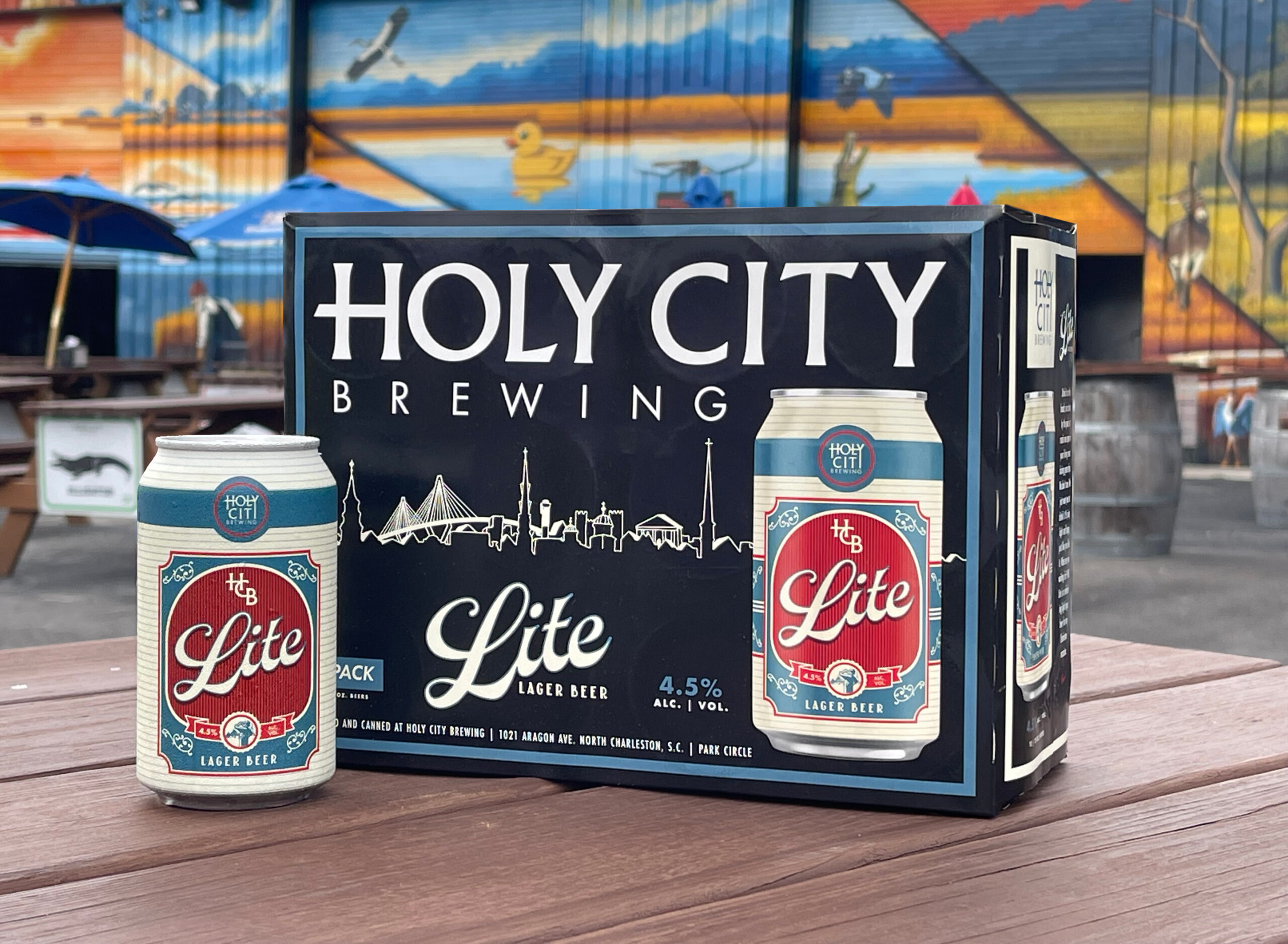 Holy City Brewing Lite Lager six-pack packaging Holy City Brewing Lite Lager six-pack packaging on a patio table